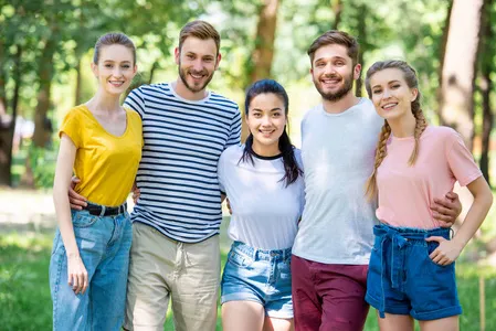 Original compressed low resolution group photo showing JPEG artifacts and blur